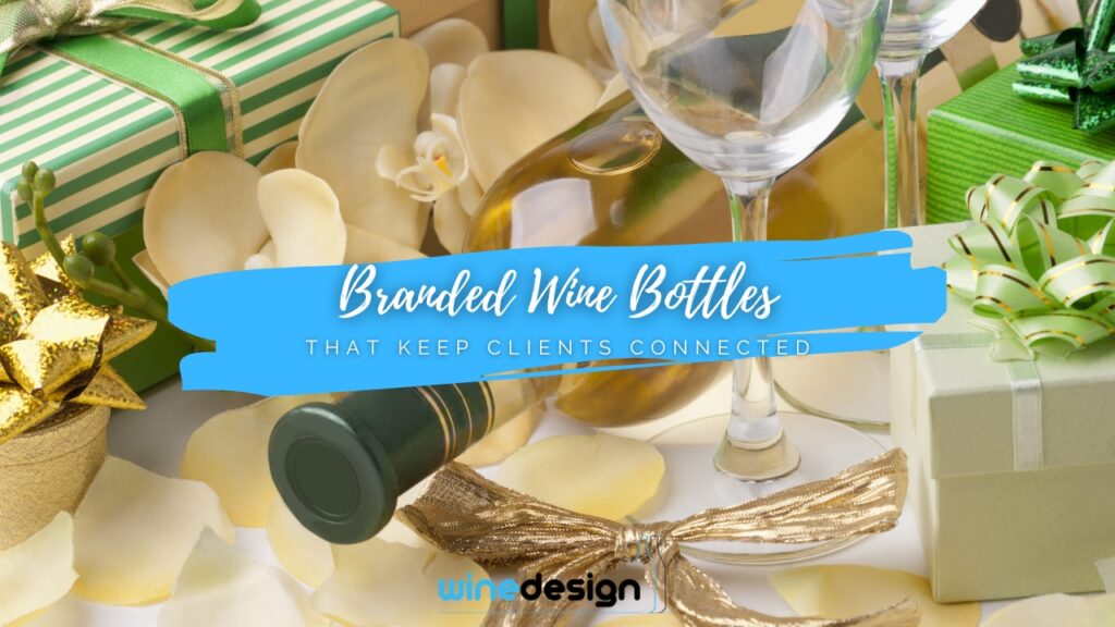 Blog - Wedding A wine bottle and glass surrounded by wrapped green gifts, bows, and white flower petals.