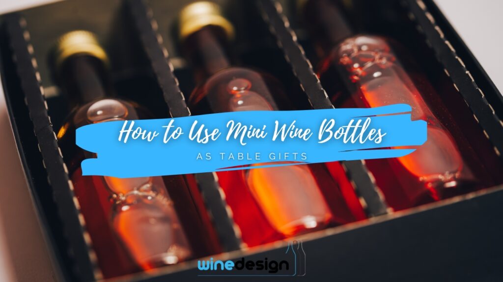 Blog - Wedding Three mini wine bottles packed neatly in a dark gift box compartment.